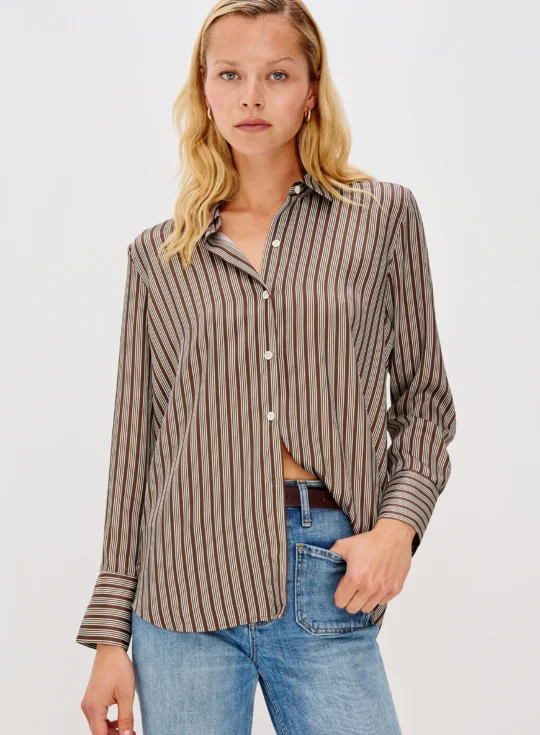 Girl wearing a Saige Blouse and jeans